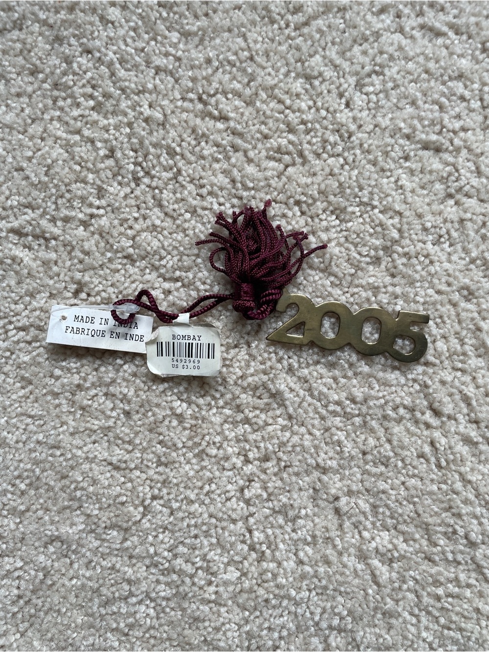 Bombay Metallic Gold 2005 Year Pendant with Burgundy Tassel